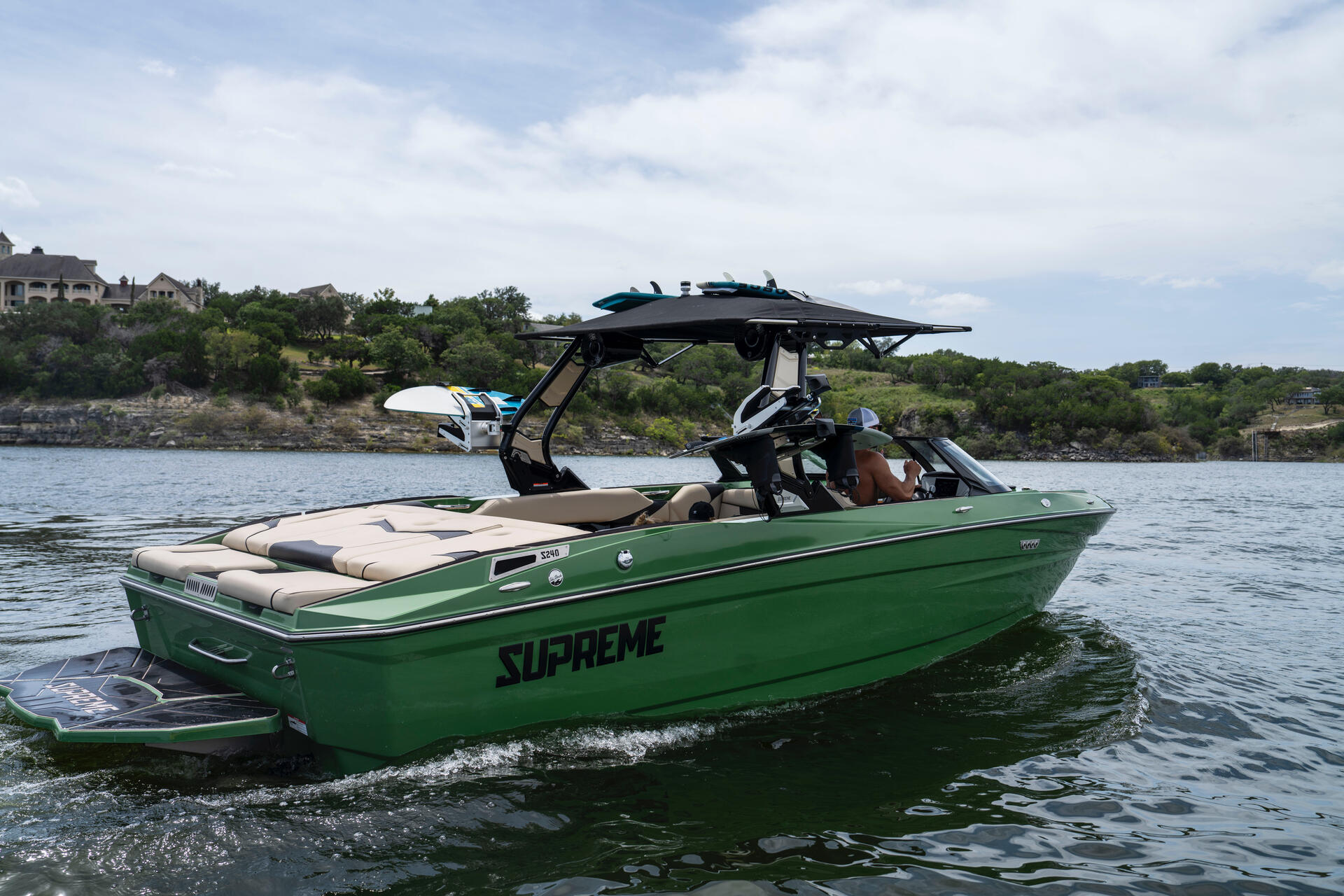 SUPREME wake boat cruising on Lake Travis